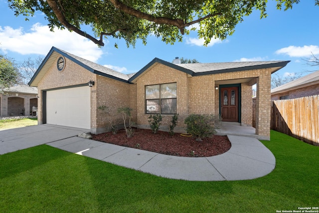 single story home with a garage and a front yard