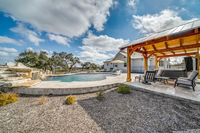 view of pool with a patio and a jacuzzi