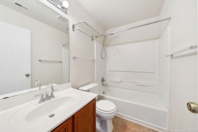 full bathroom with vanity, shower / bathing tub combination, tile patterned floors, and toilet