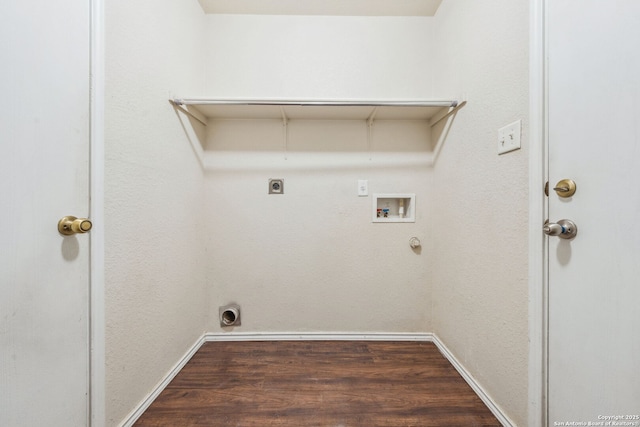 washroom with hookup for a gas dryer, electric dryer hookup, hookup for a washing machine, and dark wood-type flooring