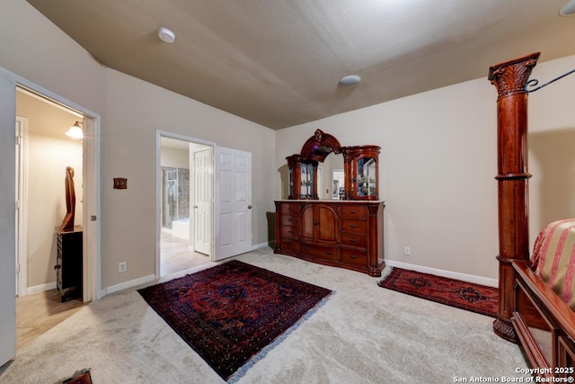 foyer entrance featuring light carpet