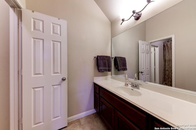 bathroom with vanity and tile patterned floors