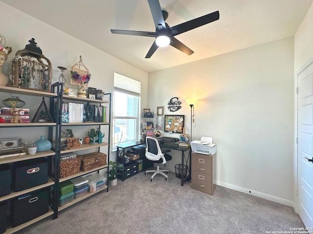 office area with carpet flooring and ceiling fan