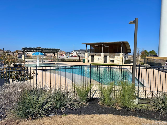 view of pool with a pergola and a patio area