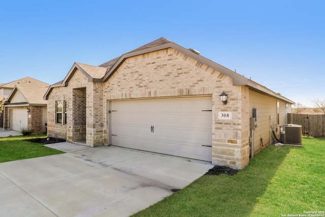 view of front of house with a front lawn and central air condition unit