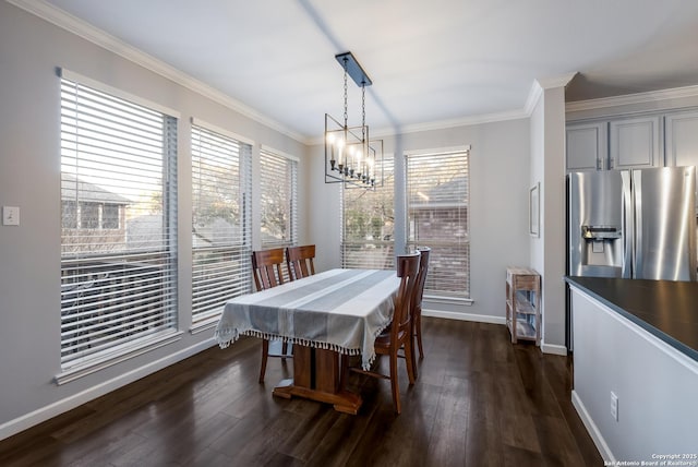 dining area with a wealth of natural light, dark wood-type flooring, and ornamental molding