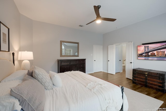 bedroom featuring ceiling fan and dark hardwood / wood-style flooring