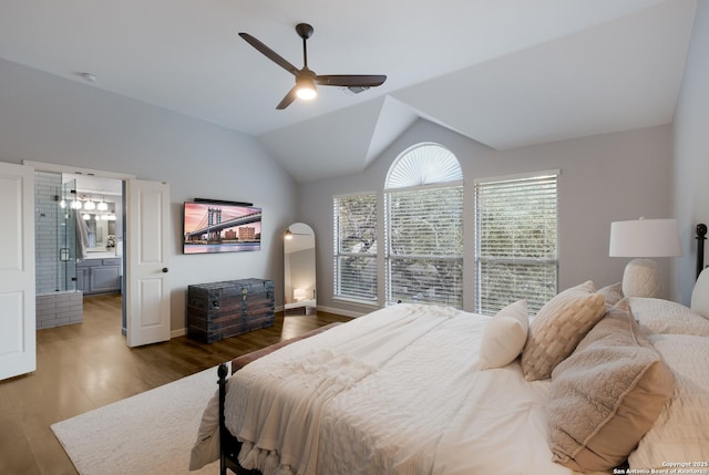 bedroom featuring hardwood / wood-style flooring, ceiling fan, and vaulted ceiling