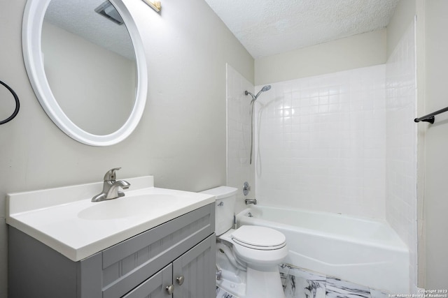 full bathroom with shower / bathtub combination, vanity, toilet, and a textured ceiling