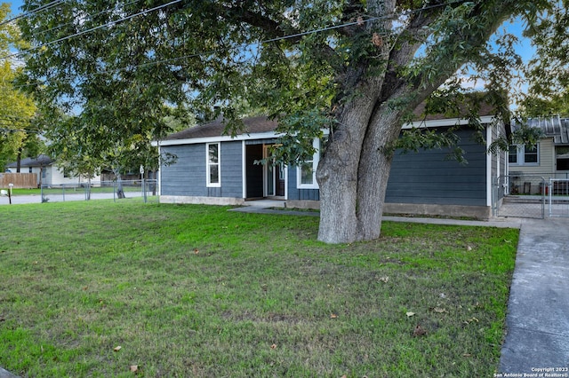 view of front of property with a front lawn