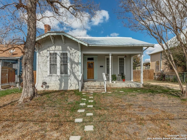 bungalow-style home featuring covered porch