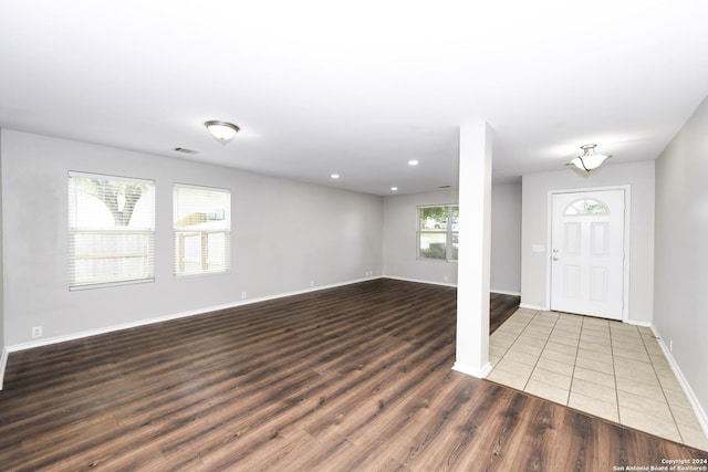 foyer entrance featuring dark hardwood / wood-style flooring