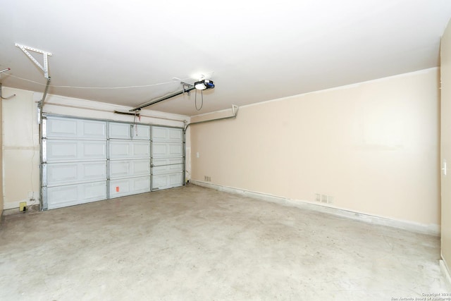 garage featuring a garage door opener