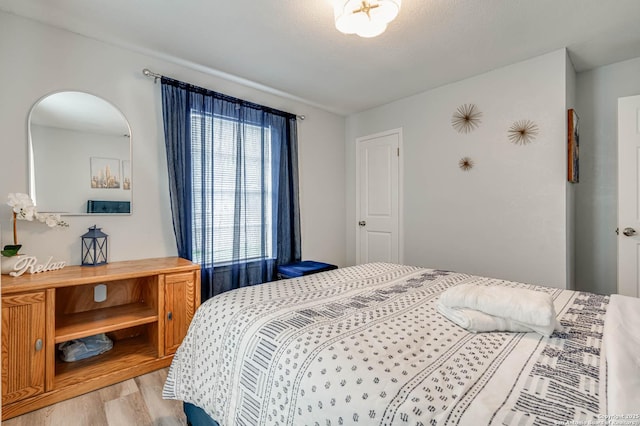 bedroom featuring light hardwood / wood-style flooring