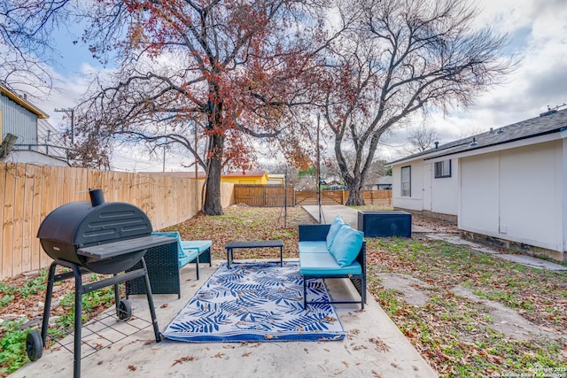 view of patio / terrace featuring an outdoor living space and grilling area