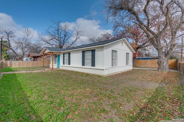 exterior space with a yard