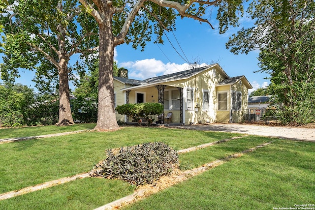 view of front of home with a front yard