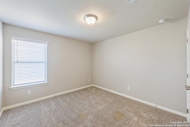 empty room with carpet floors