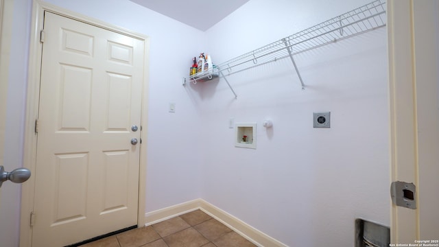 laundry room featuring gas dryer hookup, hookup for a washing machine, hookup for an electric dryer, and light tile patterned flooring