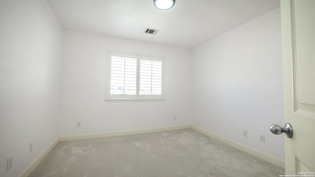 empty room with light carpet