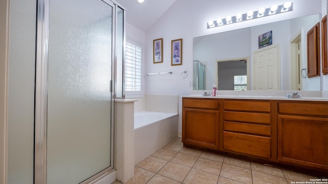 bathroom with lofted ceiling, plus walk in shower, tile patterned flooring, and vanity