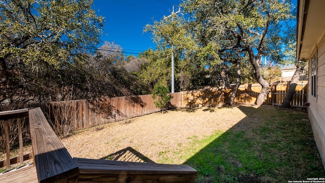 view of yard featuring a deck