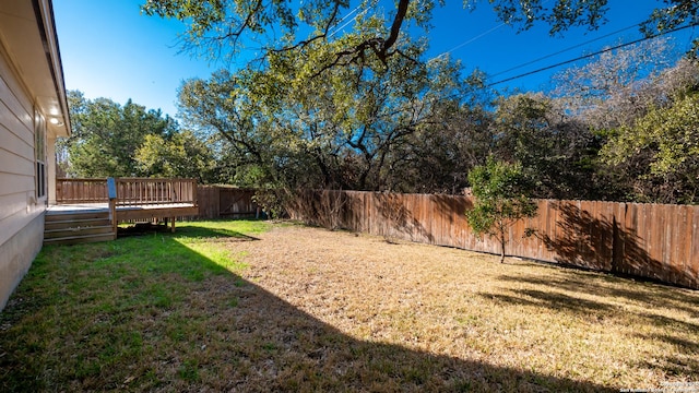 view of yard featuring a deck