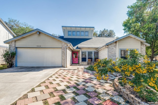 view of front of home with a garage