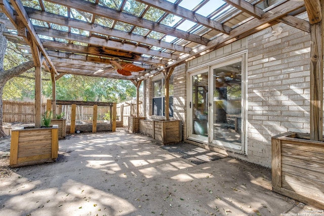 view of patio featuring a pergola and ceiling fan