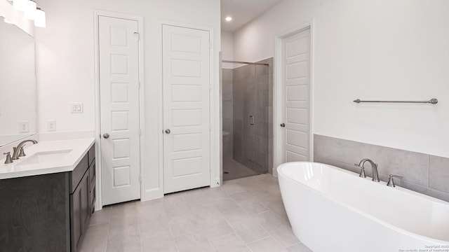 3157 Bee Hl, Schertz, TX 78108 - full bathroom featuring a stall shower, vanity, a freestanding bath, and recessed lighting