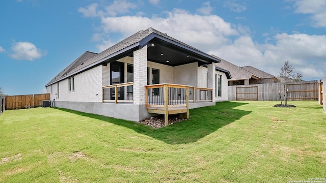 3157 Bee Hl, Schertz, TX 78108 - rear view of house featuring central AC, brick siding, and a deck