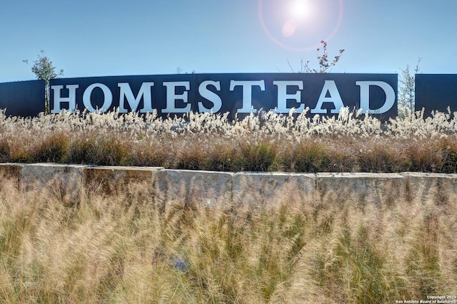 view of community sign