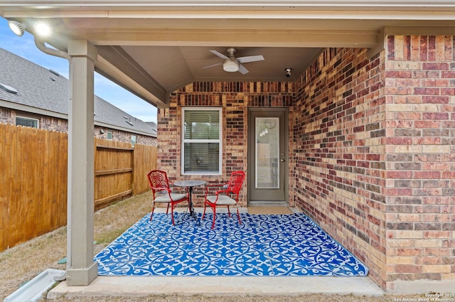 view of patio featuring ceiling fan