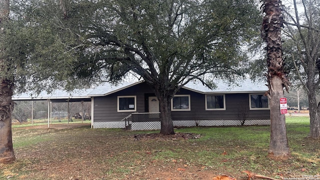 exterior space featuring a yard