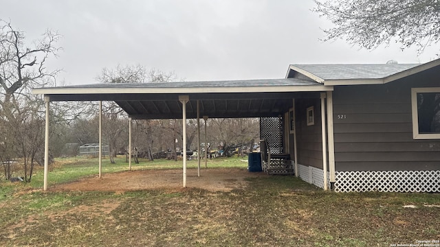 view of yard with a carport