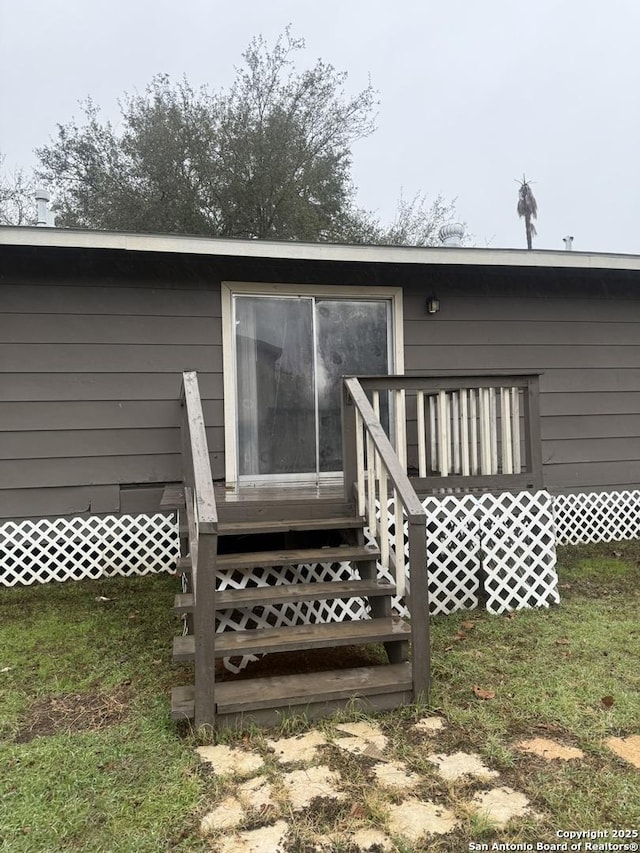 521 Quail Ln, Floresville, TX 78114 - rear view of property with a lawn