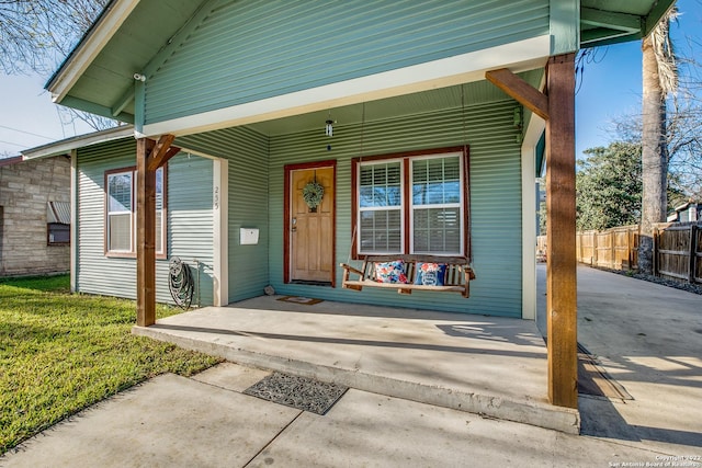 doorway to property with a porch