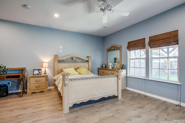 bedroom featuring ceiling fan and light hardwood / wood-style floors