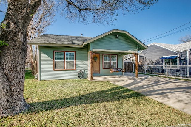 view of front of home with a porch and a front lawn