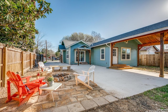 rear view of property with a patio