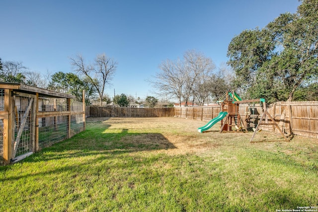 view of yard with a playground