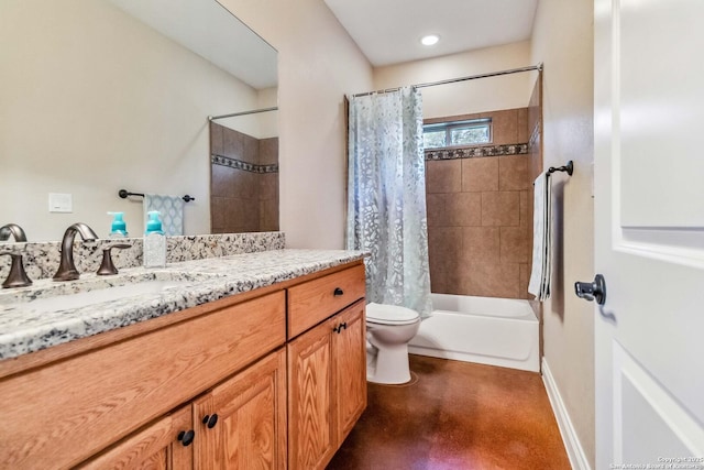 full bathroom featuring vanity, toilet, and shower / tub combo