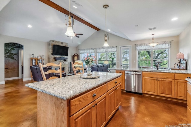 kitchen featuring decorative light fixtures, sink, vaulted ceiling with beams, a center island, and stainless steel dishwasher