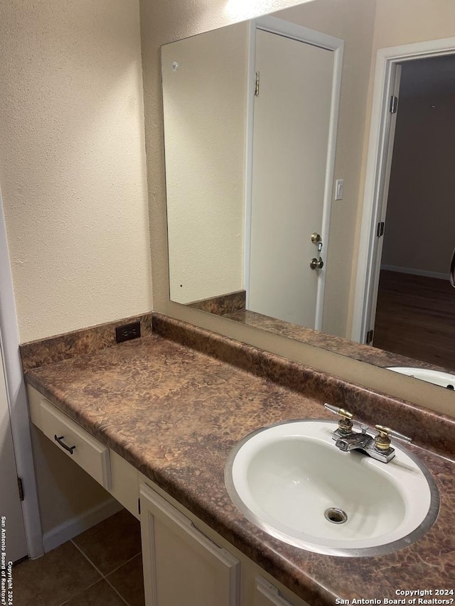 bathroom featuring vanity and tile patterned floors