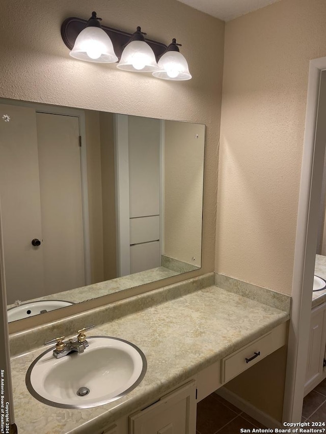 bathroom featuring vanity and tile patterned floors