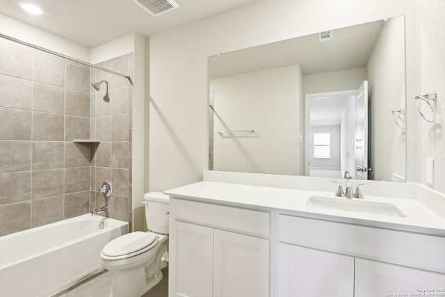 full bathroom featuring visible vents, toilet, shower / washtub combination, and vanity