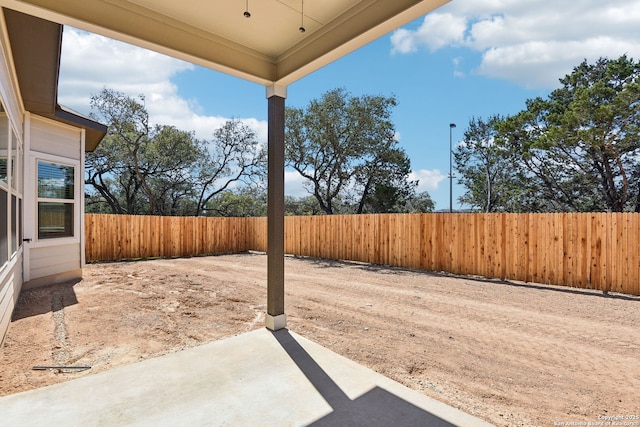 view of yard with a patio area and a fenced backyard
