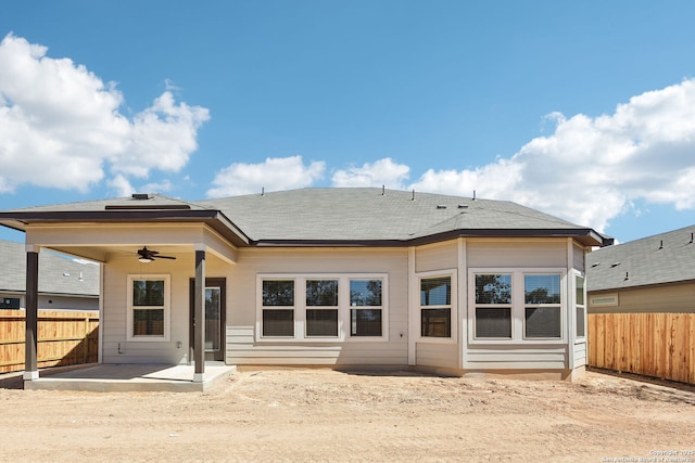 back of house featuring fence, ceiling fan, and a patio area