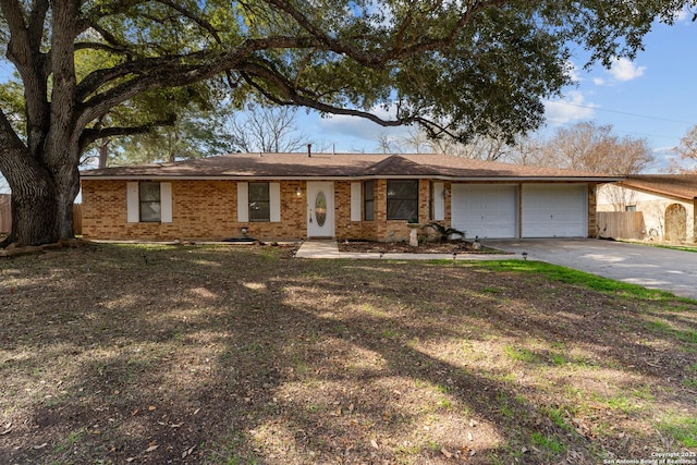 ranch-style house featuring a garage