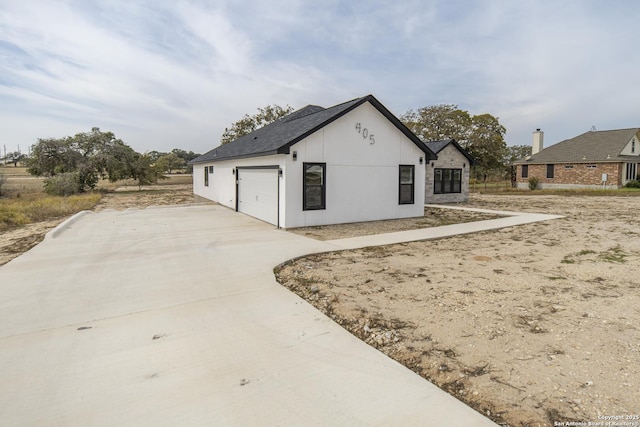 view of home's exterior with a garage